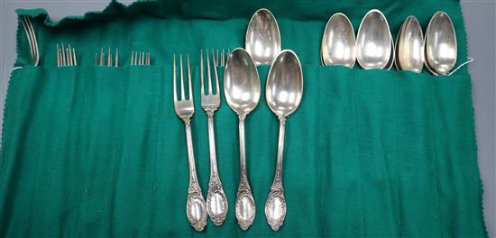 Twelve pairs of late 19th century Dutch silver dessert spoons and forks, J M van Kempen, minimum 0.833 standard (approx 38oz)